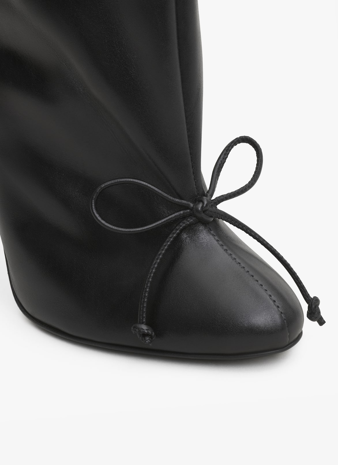 BOTTINES DÉCOLLETÉ EN CUIR ALAÏA BOTTINES DÉCOLLETÉ EN CUIR NOIR